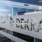 Glass wall with DEKRA lettering