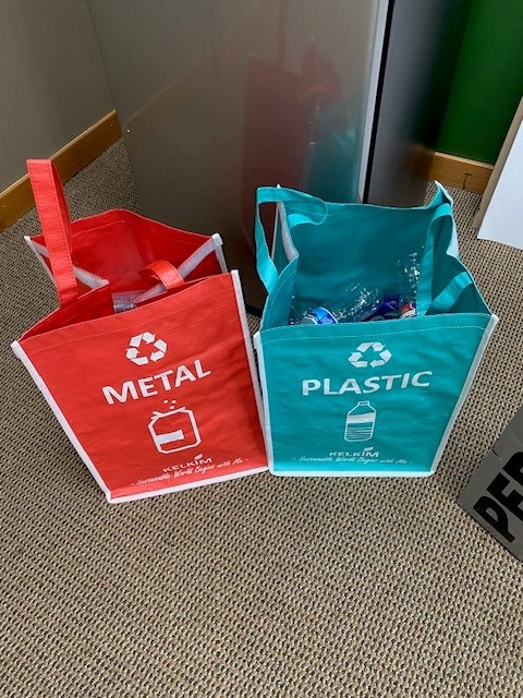 Two containers for garbage - one for plastic and the other for metal